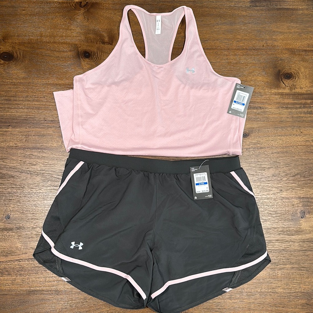 Under Armour tank AND matching shorts. Never worn, new with tags.